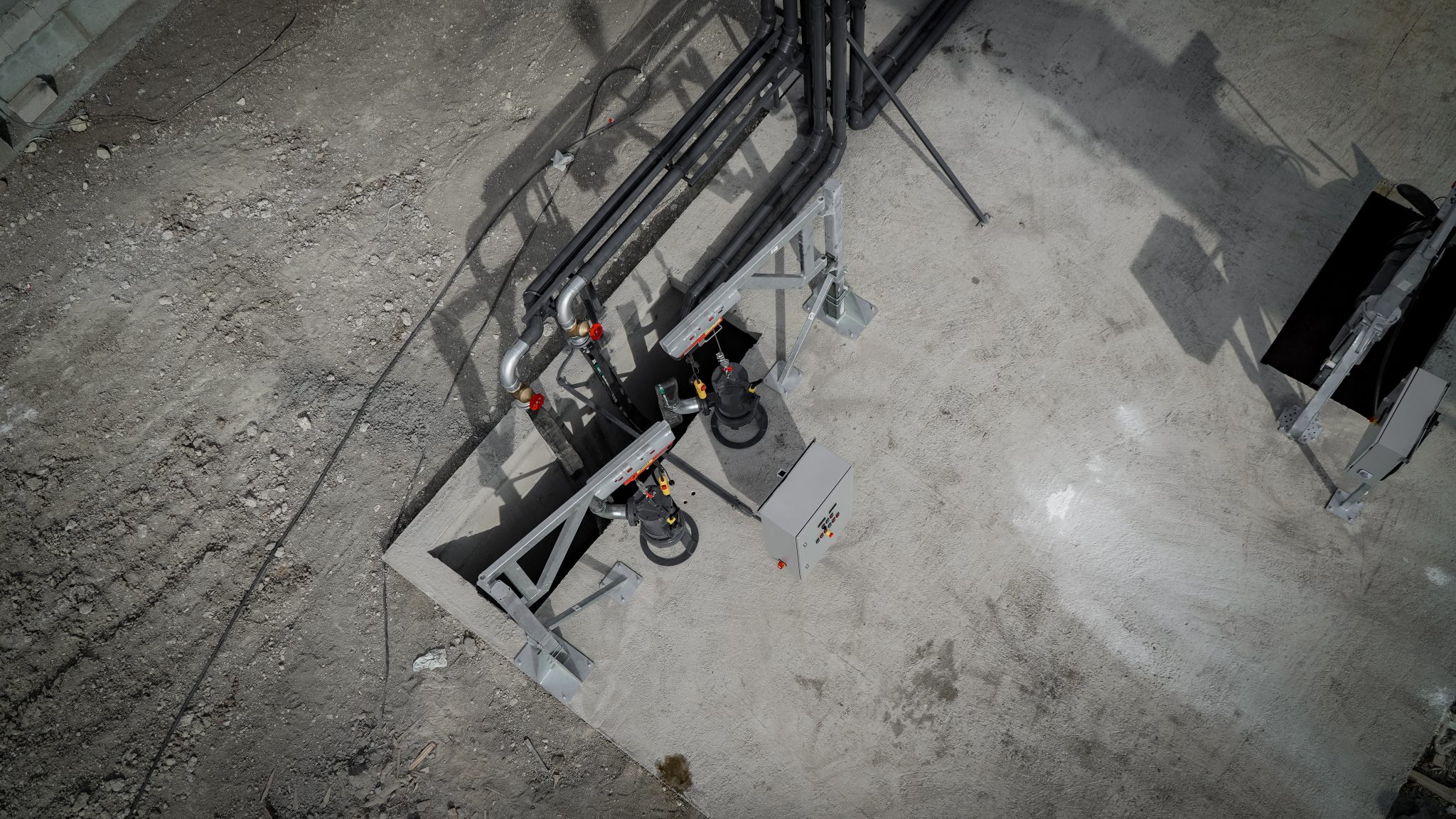 Aerial view of agricultural machinery and equipment at Agri-Pro site.