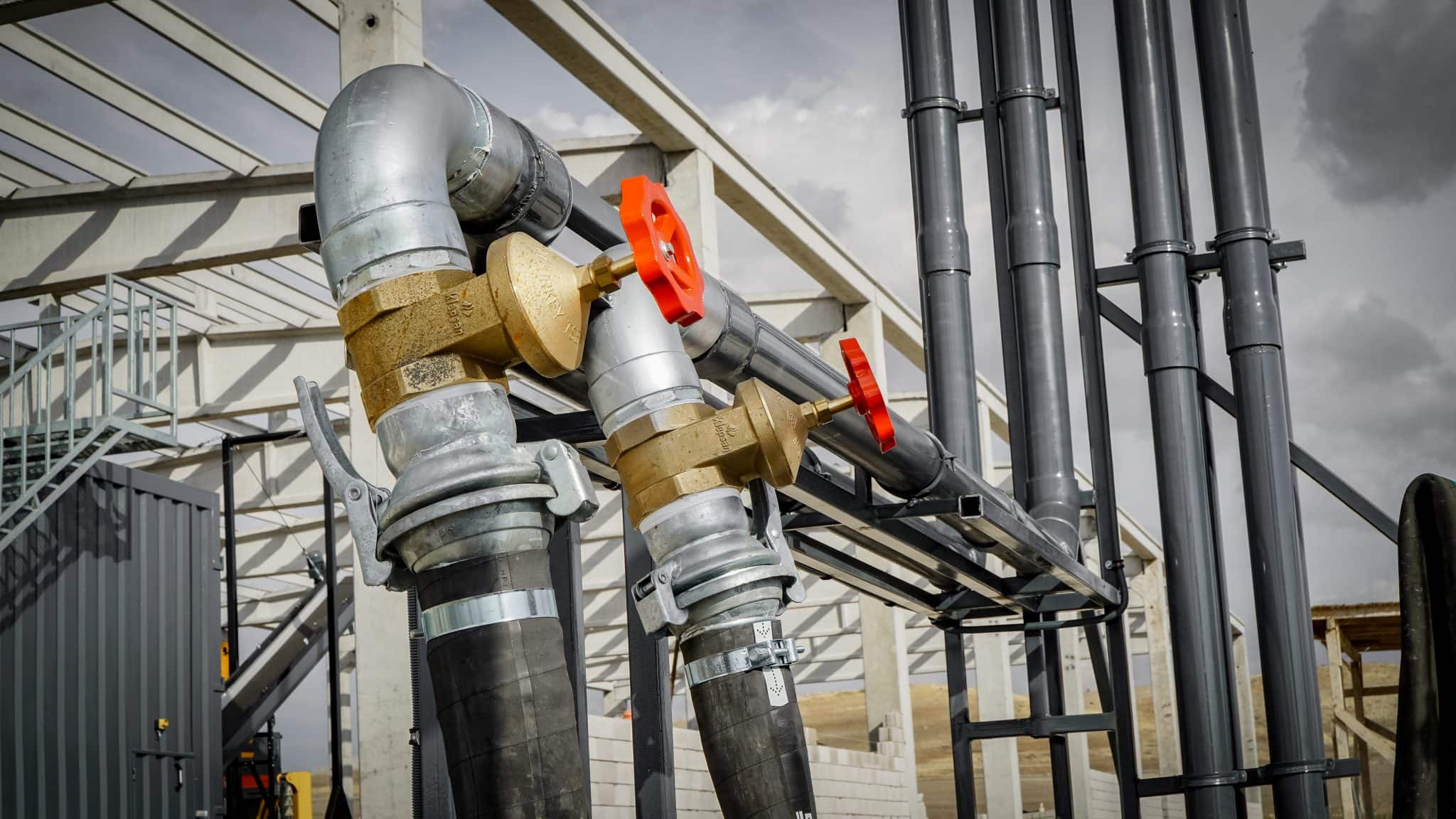 Irrigation pipes and valves at Agri-Pro farm in New Zealand.