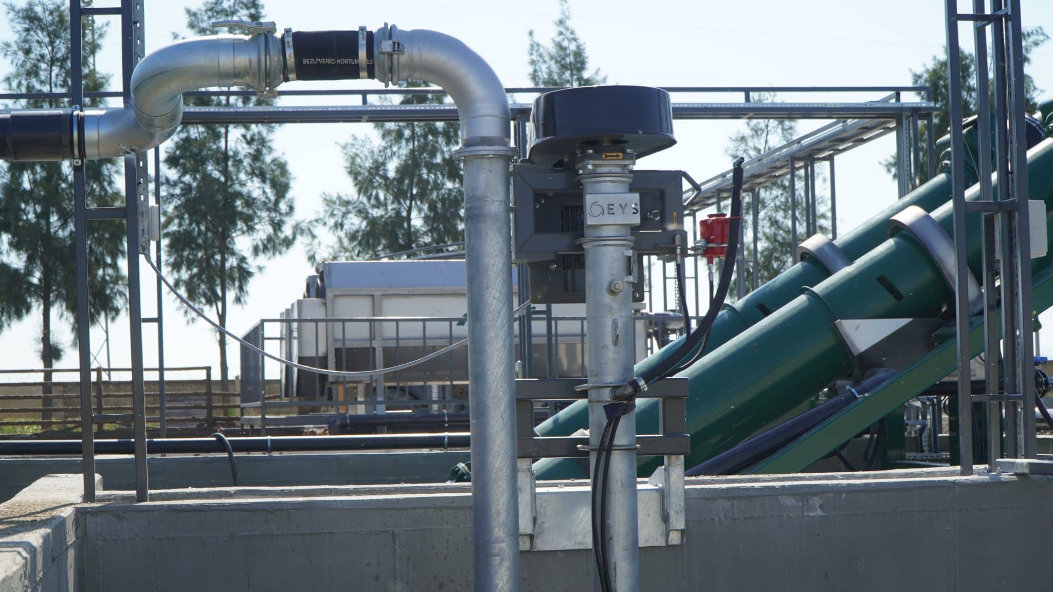 Industrial agricultural processing machinery at Agri-Pro facility in New Zealand.