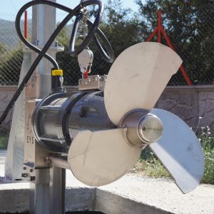 Close-up of a modern agricultural propeller with blades and motor.